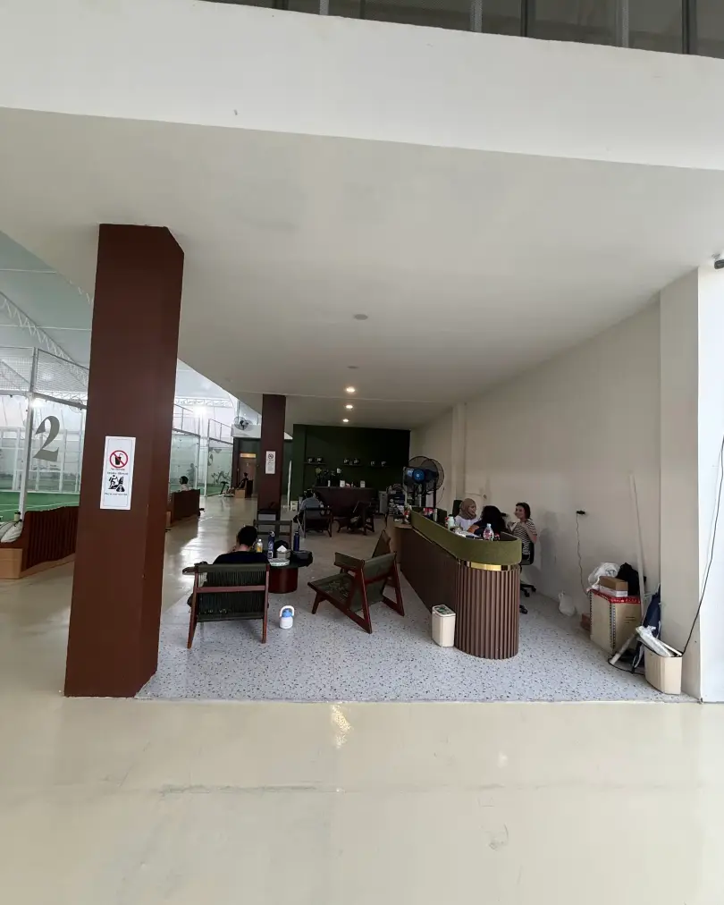 Lounge area by the courts