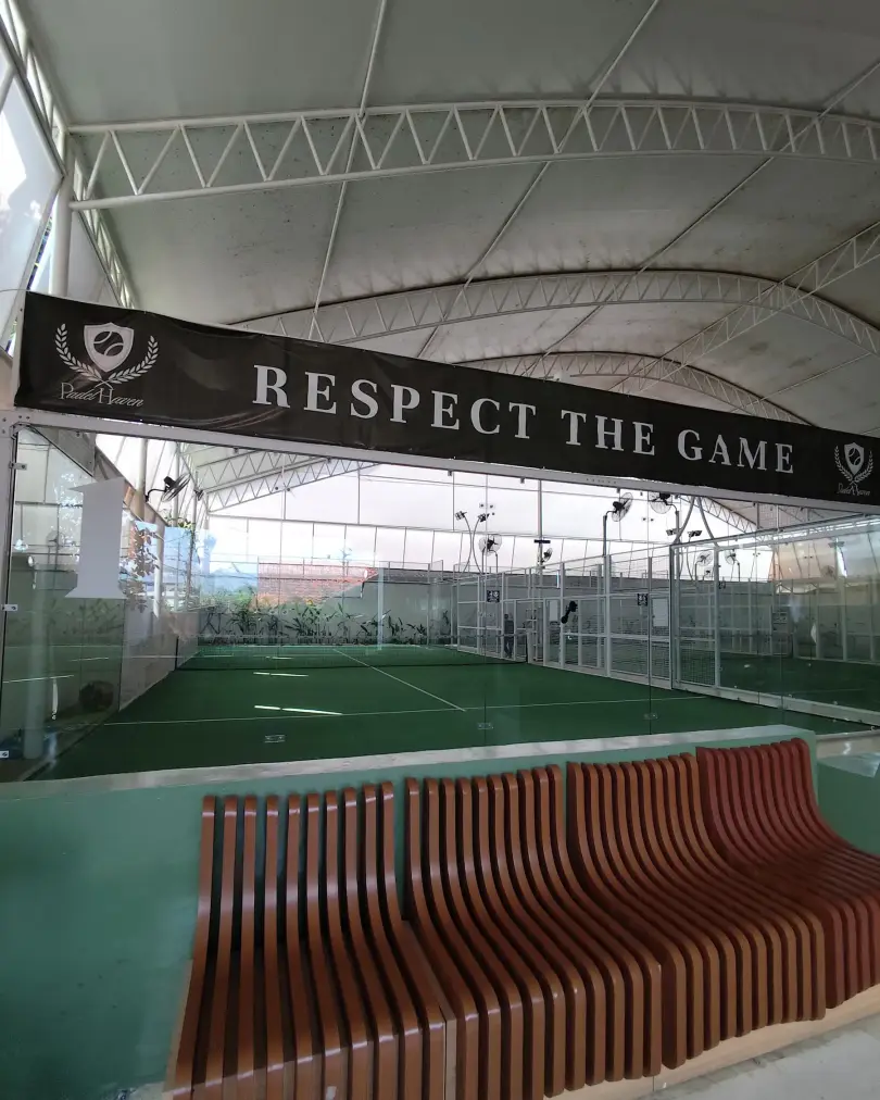 Respect the Game banner above the court and bench